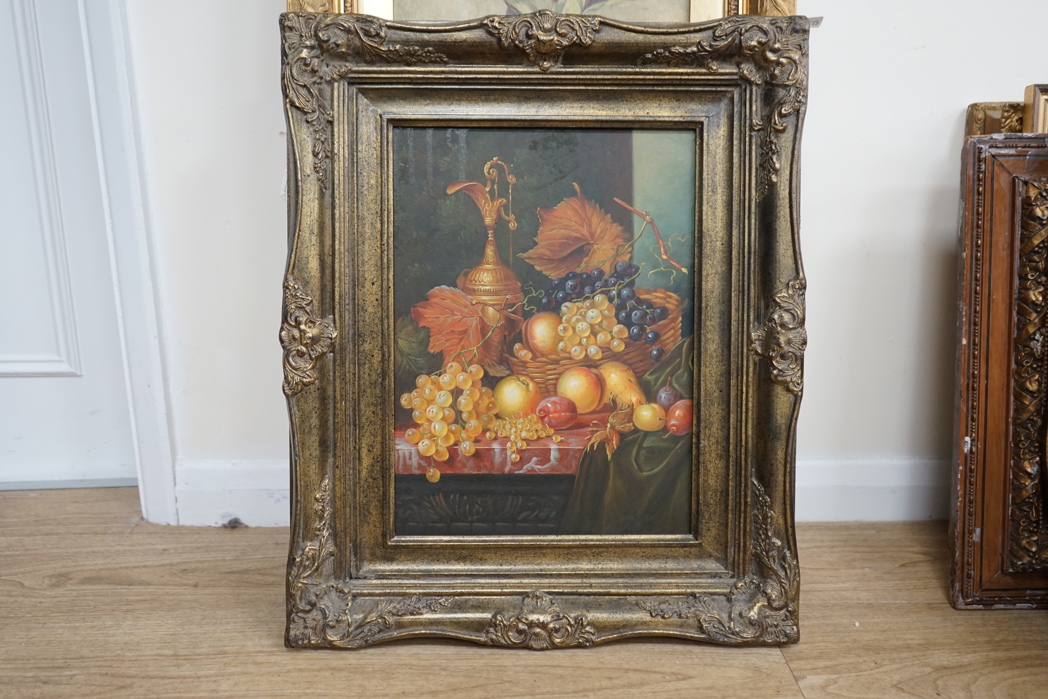 A reproduction oil on board in the 17th century Dutch style, Still life of fruit and vessels, unsigned, 39 x 29cm